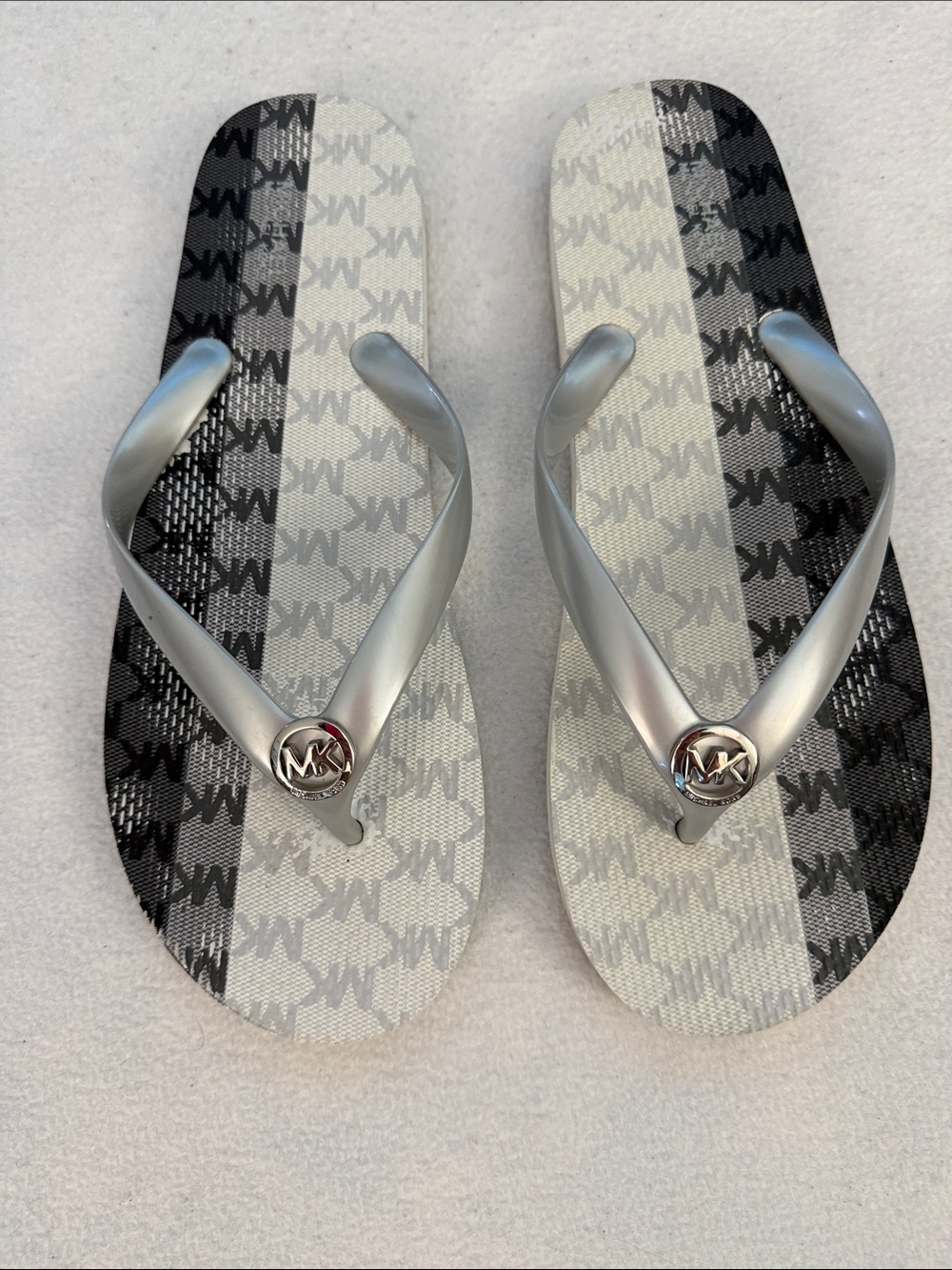 Michael Kors Silver Strap Flip Flops with Black & Gray MK Print